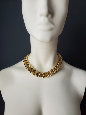 A must have for every Bad Girl! Our simple and sleek design, combined with our signature 18mm chain, makes this piece a timeless statement piece. The BADDIE CHOKER can be dressed up or down and looks great layered with other gold chain necklaces! -Gold color plating-Nickel-free chain link-Handmade in Cincinnati Every order is handmade direct from our production facility in Cincinnati, OH. Items are typically completed within 5-7 business days and then require additional shipping time to reach your location.