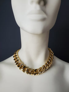 A must have for every Bad Girl! Our simple and sleek design, combined with our signature 18mm chain, makes this piece a timeless statement piece. The BADDIE CHOKER can be dressed up or down and looks great layered with other gold chain necklaces! -Gold color plating-Nickel-free chain link-Handmade in Cincinnati Every order is handmade direct from our production facility in Cincinnati, OH. Items are typically completed within 5-7 business days and then require additional shipping time to reach your location.